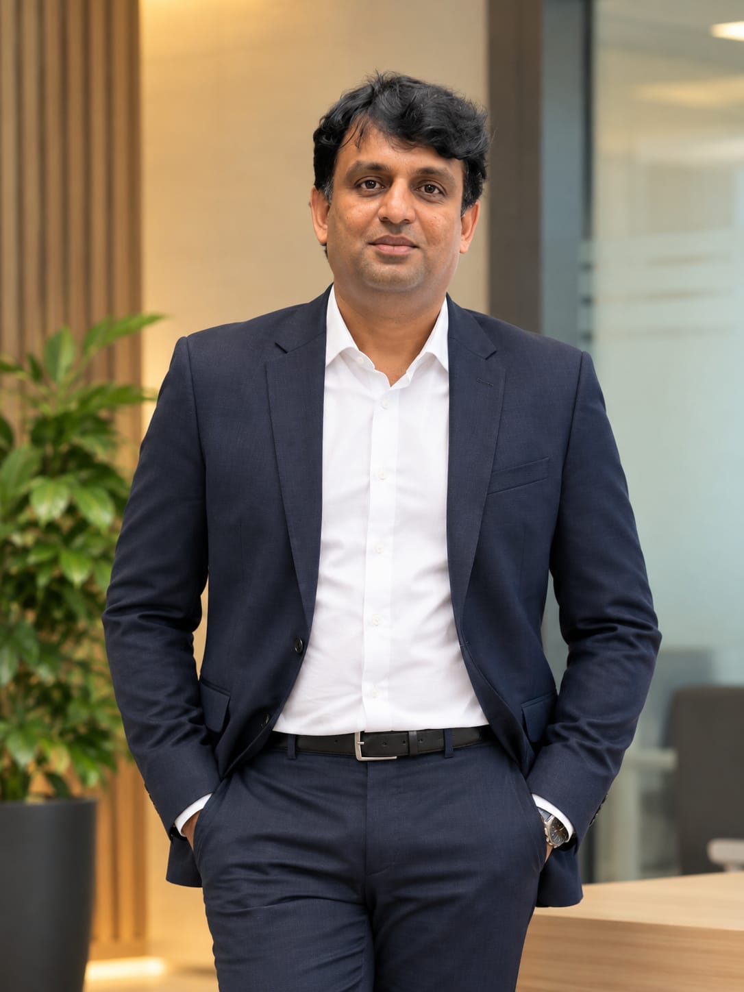 Praveen M., CEO & Director